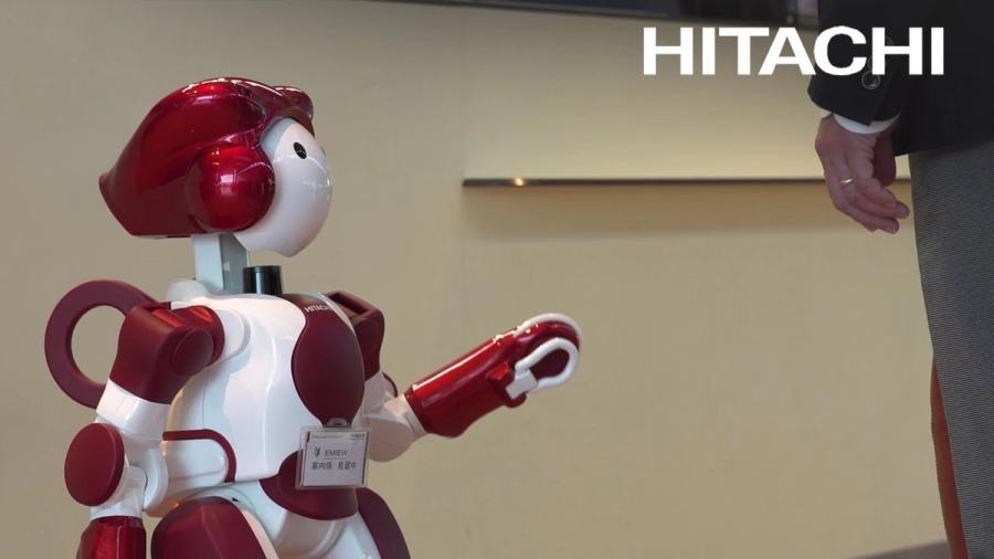 Emiew helps passengers at Tokyo International Airport.