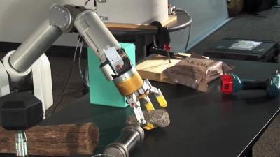 WAM manipulates common tools and everyday objects.