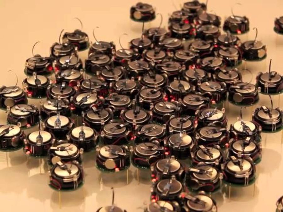 A swarm of Kilobots up close.