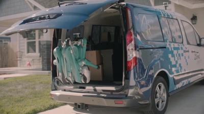A robot delivers a package.