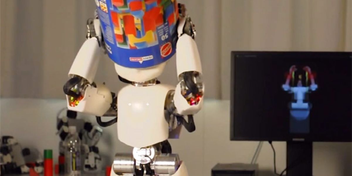 Robot Puts Box On Head